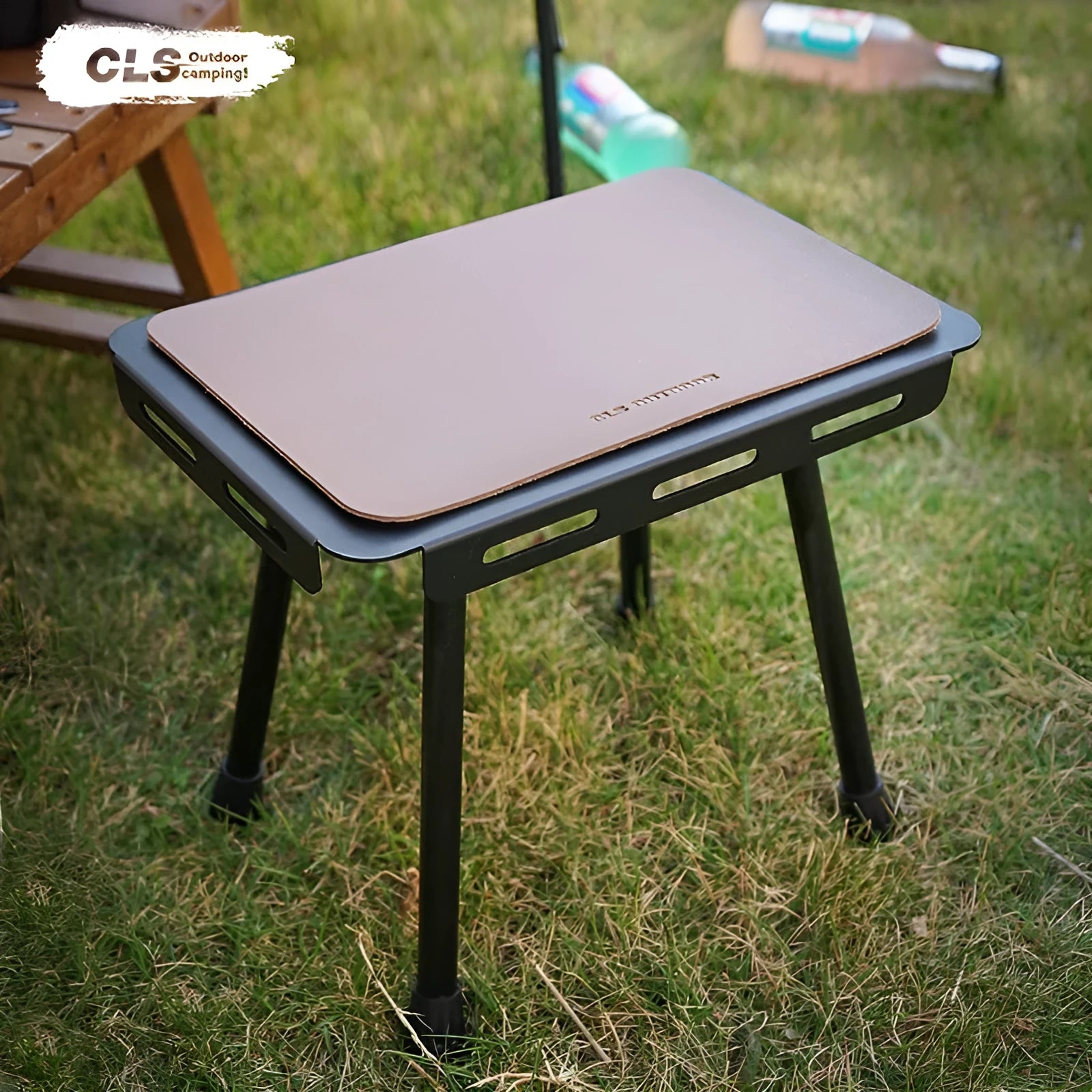 CLS aluminium alloy dual-use folding camping stool shown in tactical colour, set up as both a seat and a small raised table.