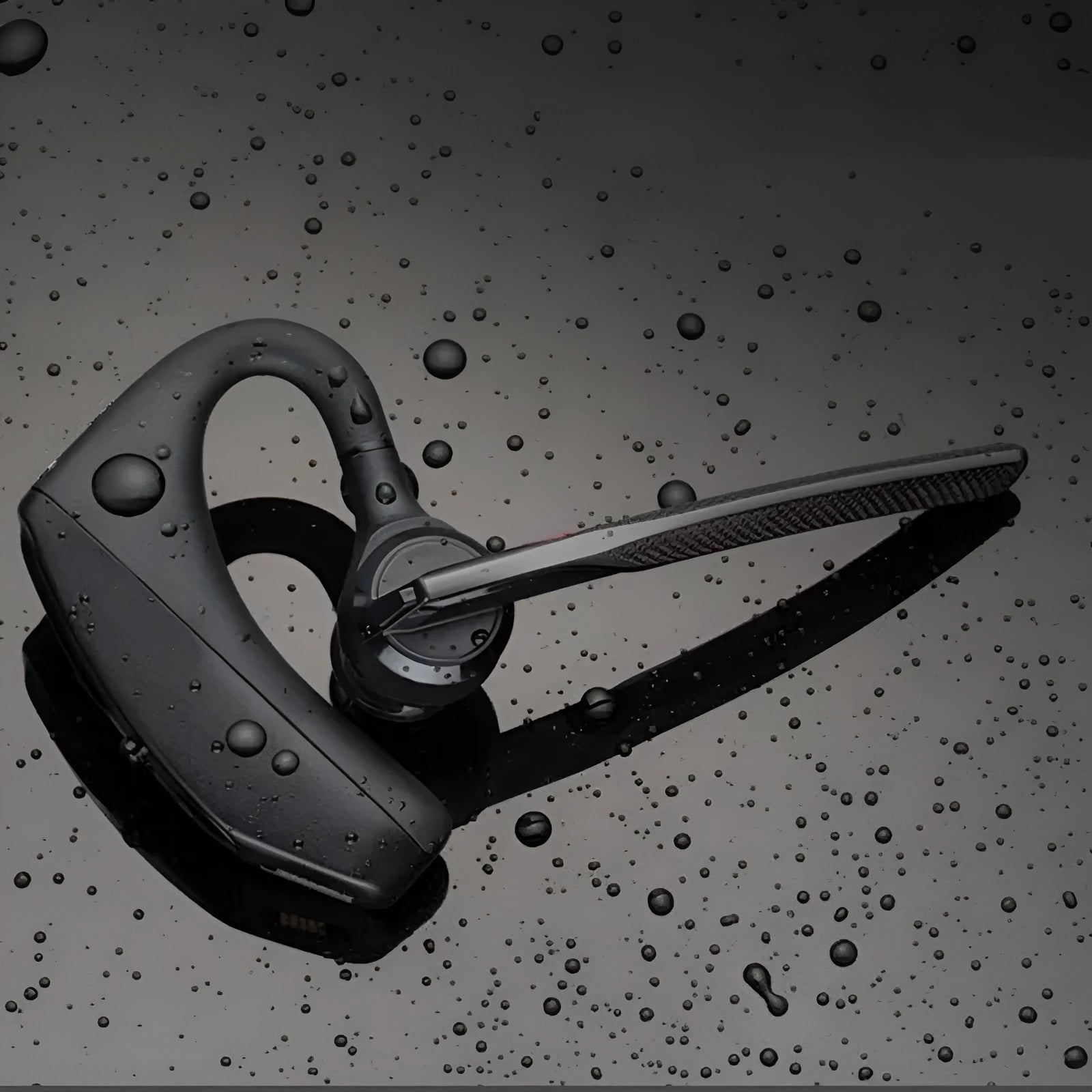Black minimalist Bluetooth sports headphones with a large battery and call function.