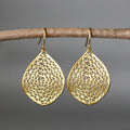 Gold retro drop earrings with hollow leaf pendant design in openwork metal
