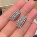 Geometric white gold colour stud earrings with zircon inlaid detailing for women