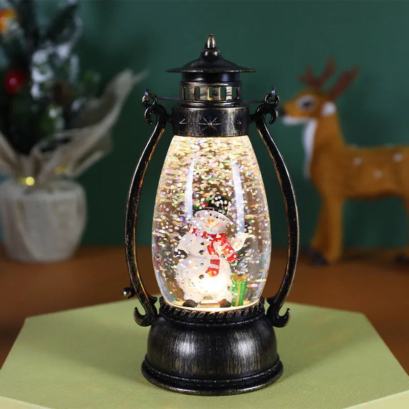 LED light-up crystal ball oil lamp Christmas ornament showing snowman or elderly figure design on a desktop.