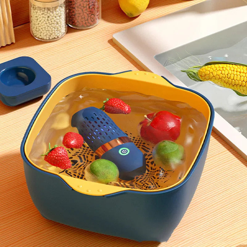 Blue capsule fruit and vegetable cleaner on a kitchen surface with USB charger