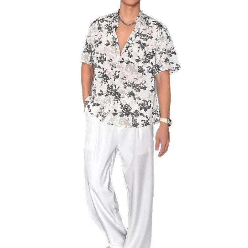 Loose fit floral printed short sleeve shirt in white or black with pendant-style front