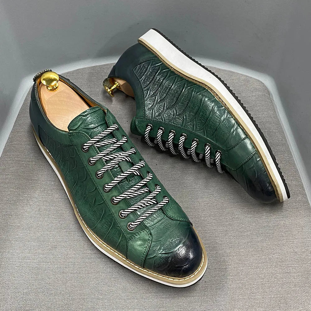 Men's low-top handmade lace-up shoes with an embossed pattern on the upper, shown in a choice of colours.