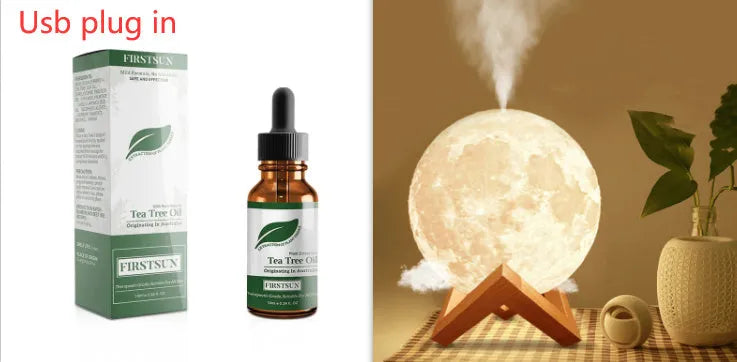 Spherical white Lunar humidifier night light with USB charging port and essential oil bottle