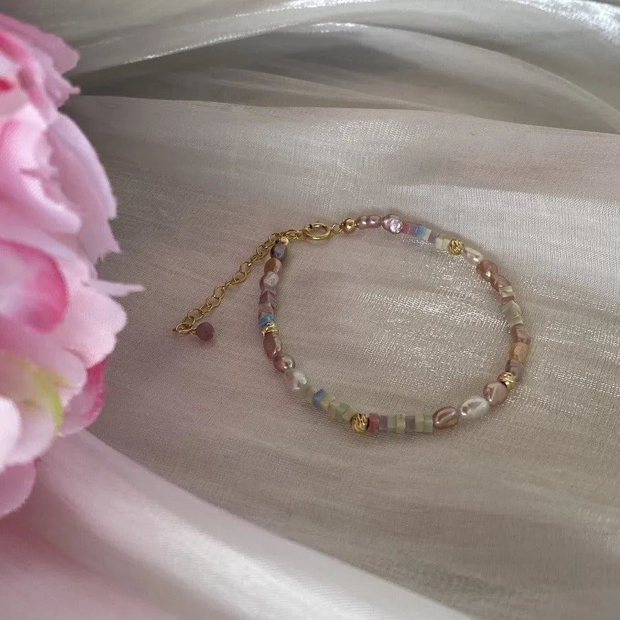 Handmade women's pearl jewellery set with purple natural pearls and 14K gold gilding