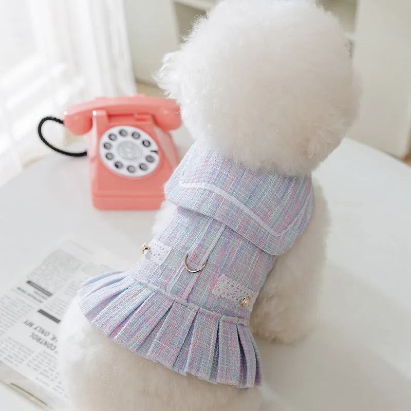 Polyester pet clothes for cats and small dogs in purple and pink colours showing four size options