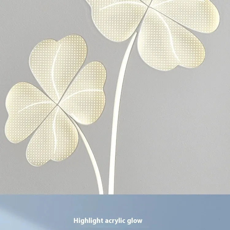 Modern bedside lamp with acrylic shade and iron construction showing tricolour LED illumination