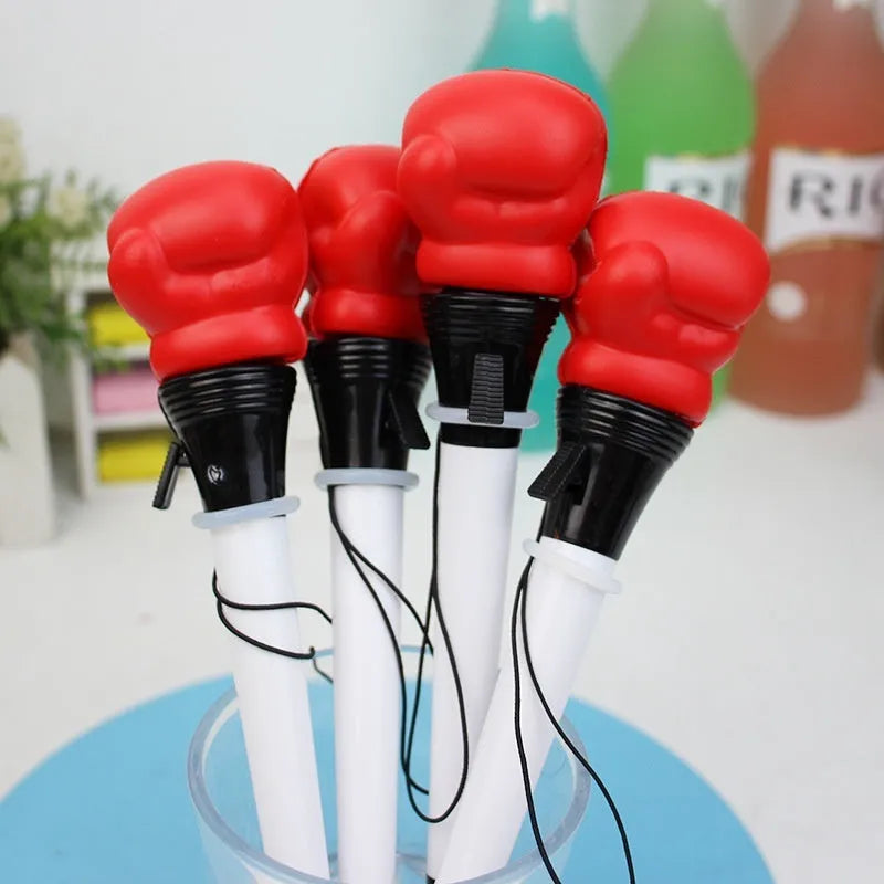 Set of four pressure relief pens with boxing press ejection mechanism and black 0.7mm refills