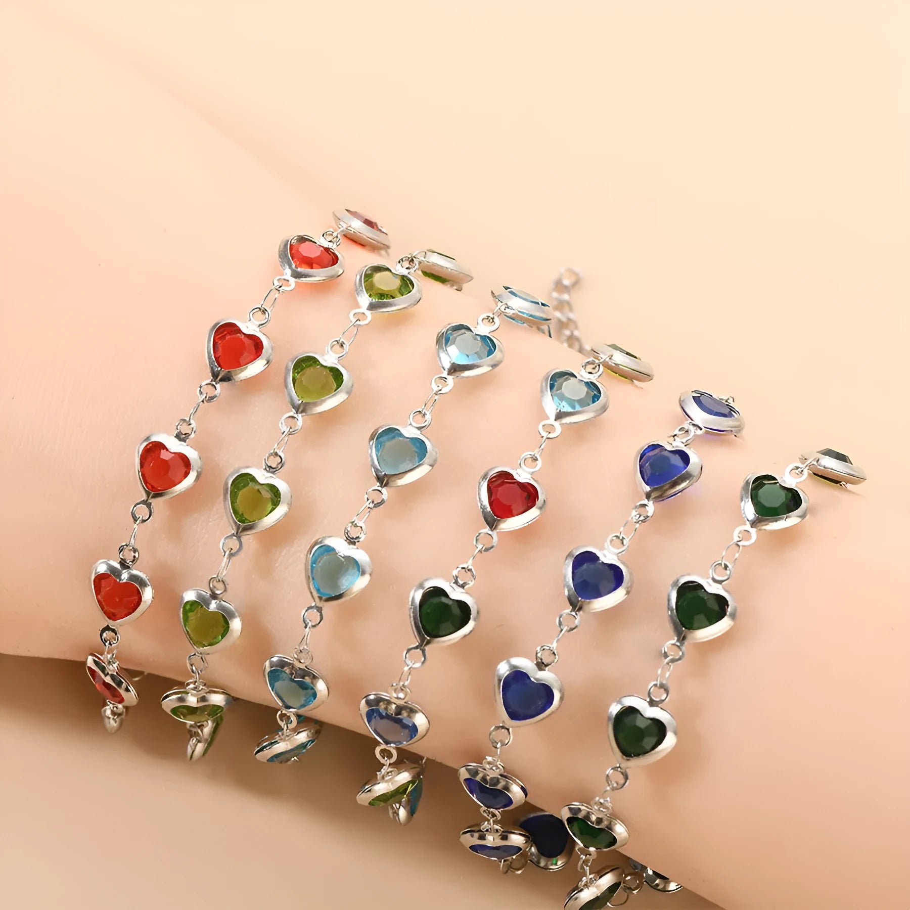 Devil's Eye geometric heart-shaped stainless steel bracelet in one of six colour options on a wrist.