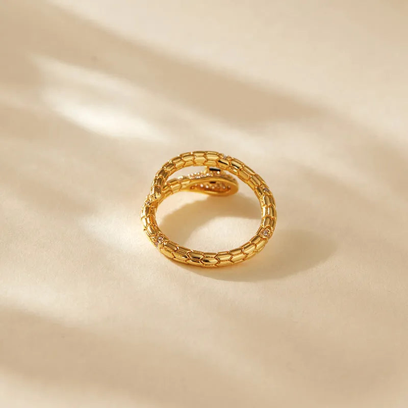 Adjustable snake finger ring with gold plating on copper and diamond treatment surface