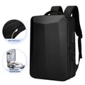 Black waterproof ABS PC business backpack with a curved shoulder strap, shown next to a laptop.