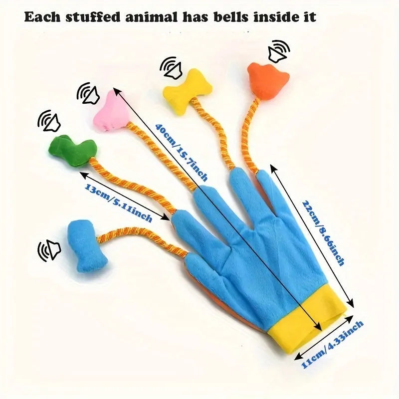 Yellow and blue plush pet toy with glove design, integrated bell, and trailer measuring 40×11 cm