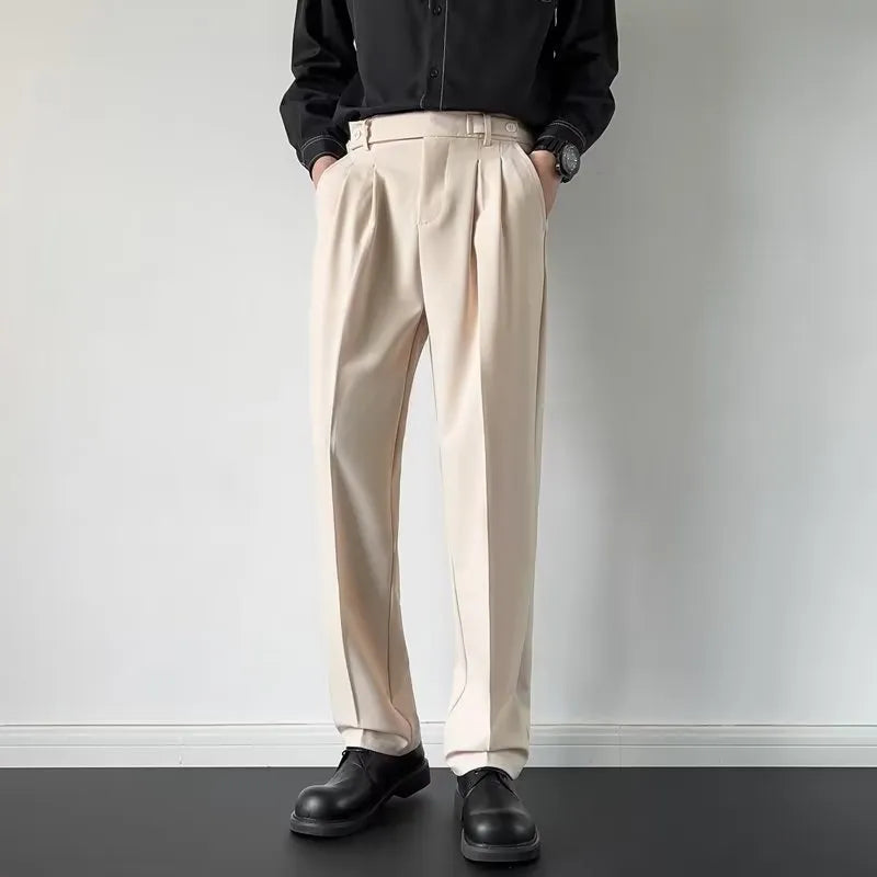 Men's straight fit suit trousers in apricot colour showing looser leg cut and polyester fabric texture
