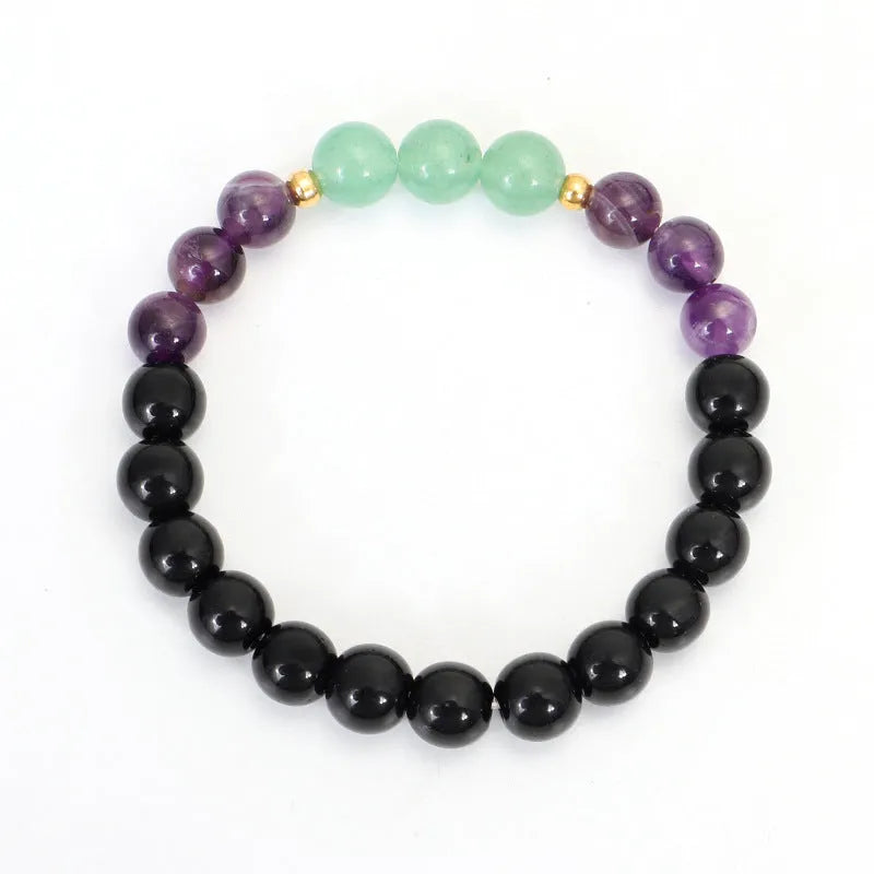 Handmade stone bead necklace with geometric alloy lotus pendant and matching adjustable bracelet.