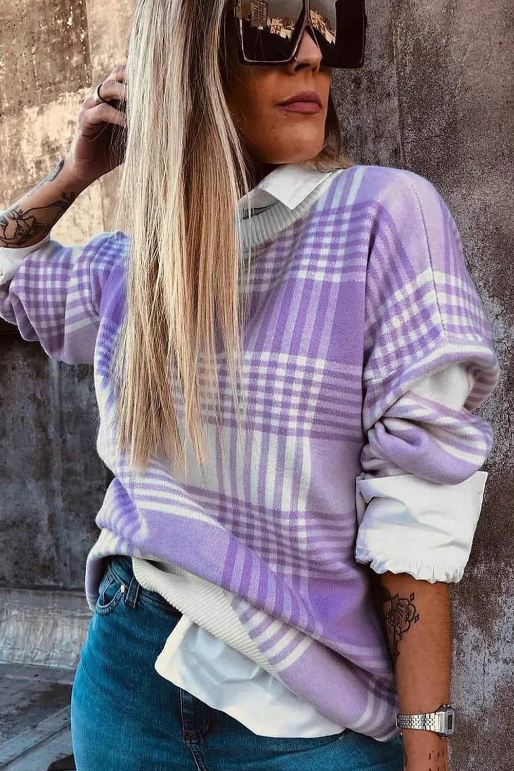 Lilac plaid print loose-fitting long sleeve women's sweater with ribbed trim detail.