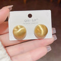 Simple round copper earrings in gold colour with electroplated finish