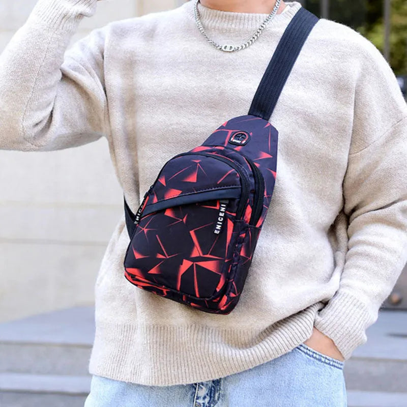 Men's crossbody messenger bag with earphone hole in Oxford cloth, showing zipper opening and shoulder strap