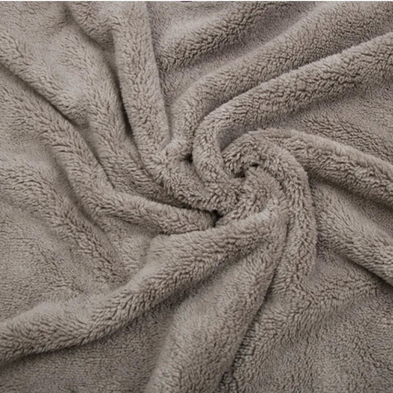 Three size options of a blue microfiber car wash and drying towel laid flat.