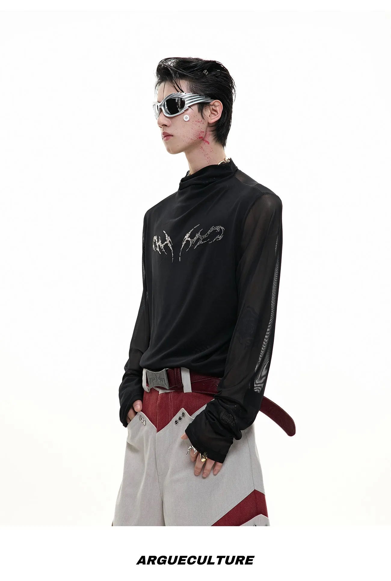 Black niche mesh slim-fit long sleeve bottoming shirt laid flat, showing trendy style and texture.