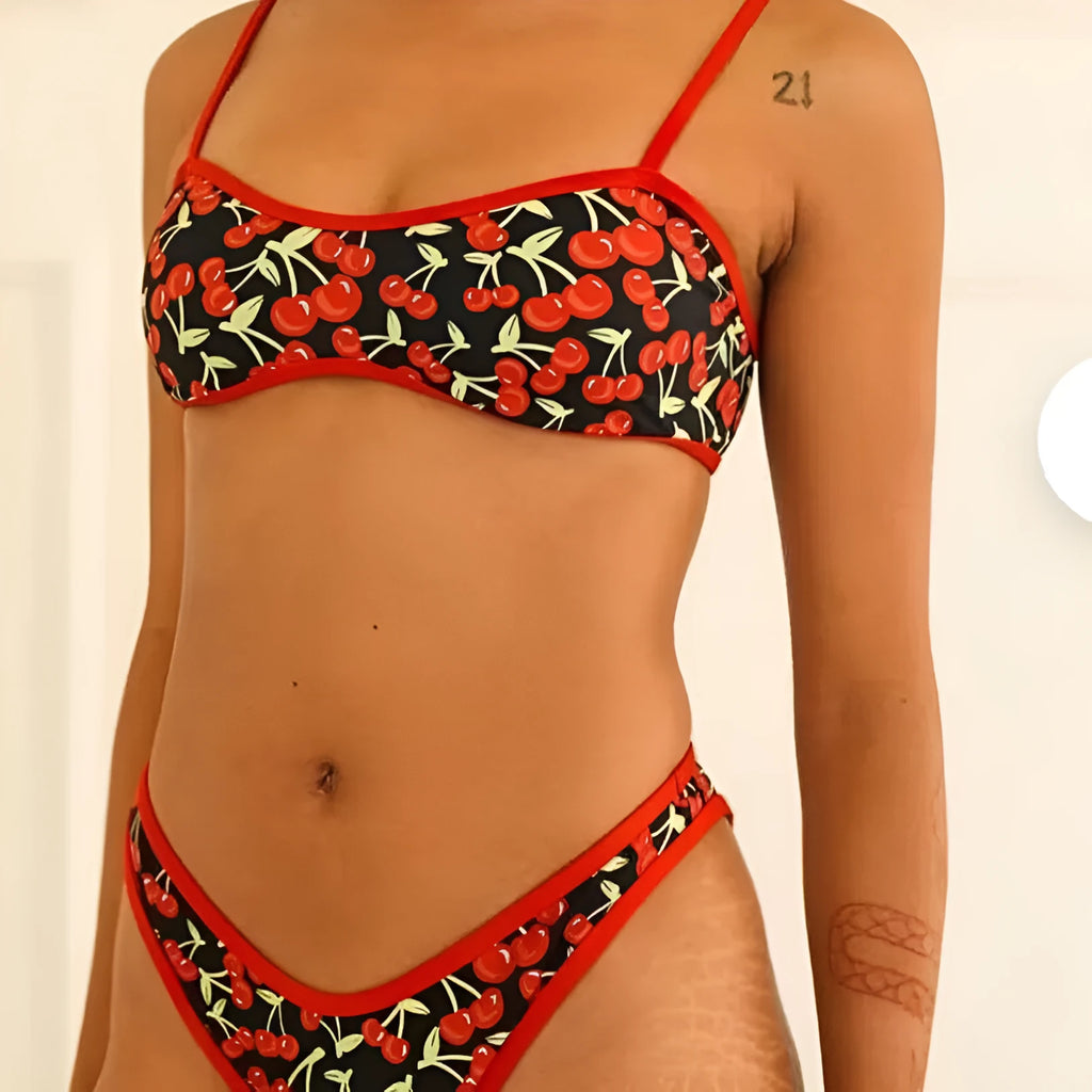 Women's cherry print floral tube top bikini swimsuit in polyester fabric.