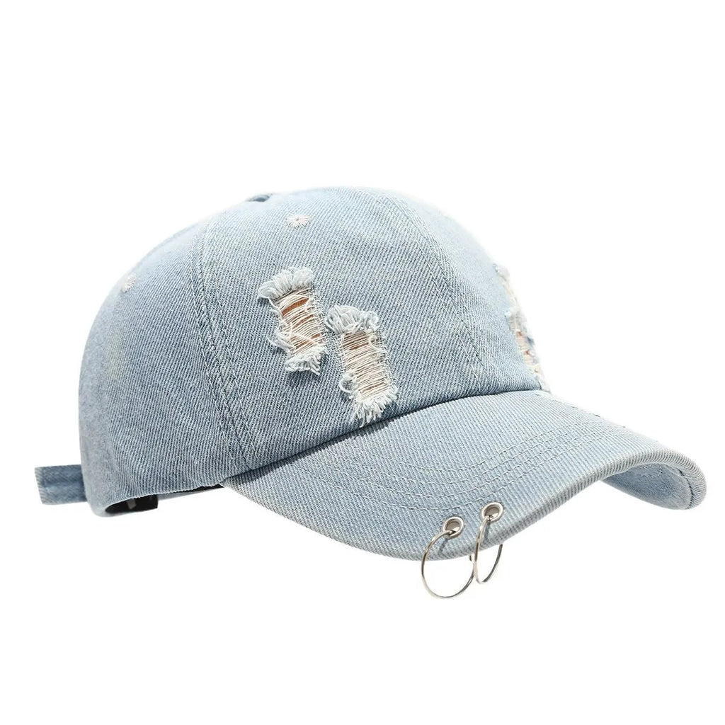 Men's black denim peaked cap with adjustable strap and dome crown on a plain background.