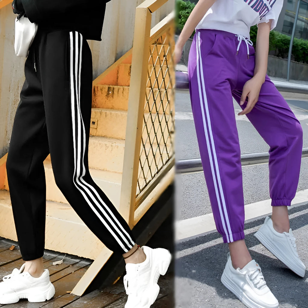 Quick-drying women's track pants in solid colour, loose-fit harem style with elastic waist