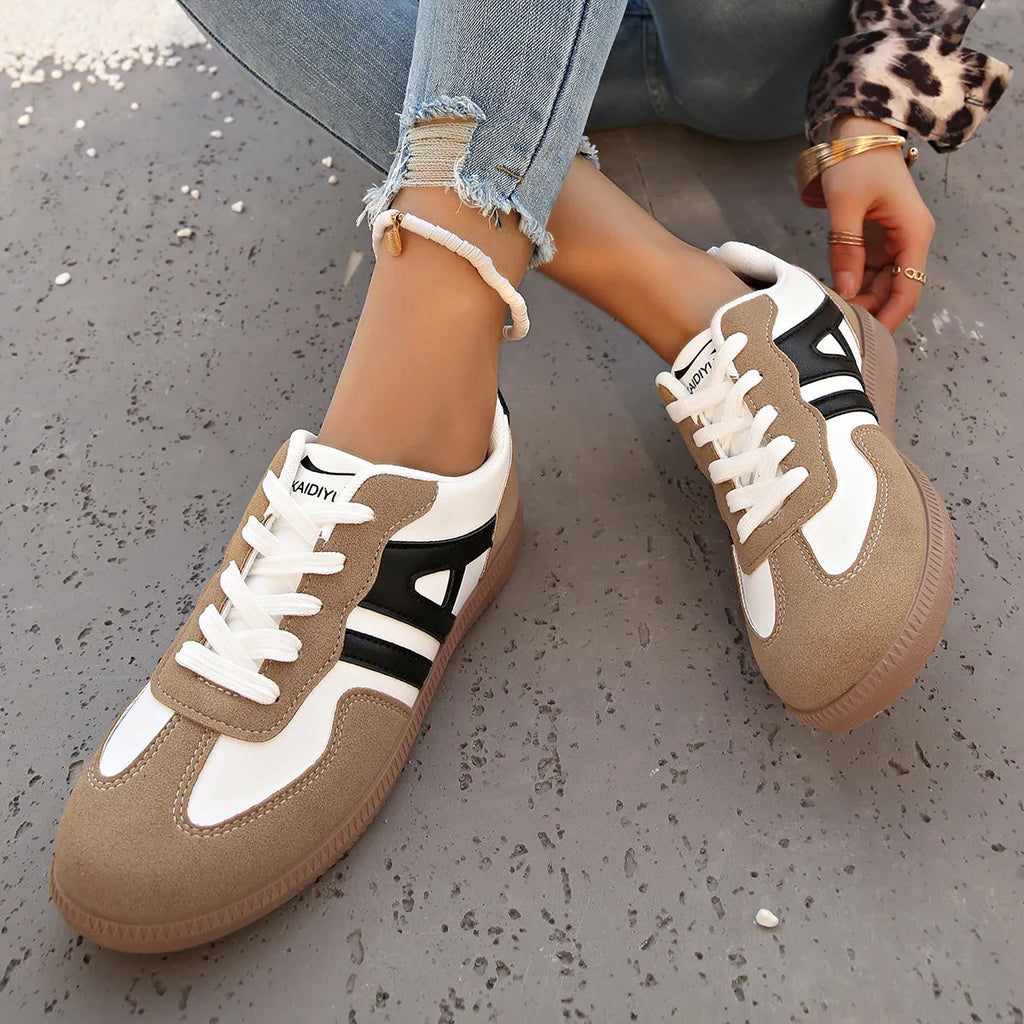 Women's retro lace-up jogging shoes in black, grey, or khaki with a platform heel and rubber sole.