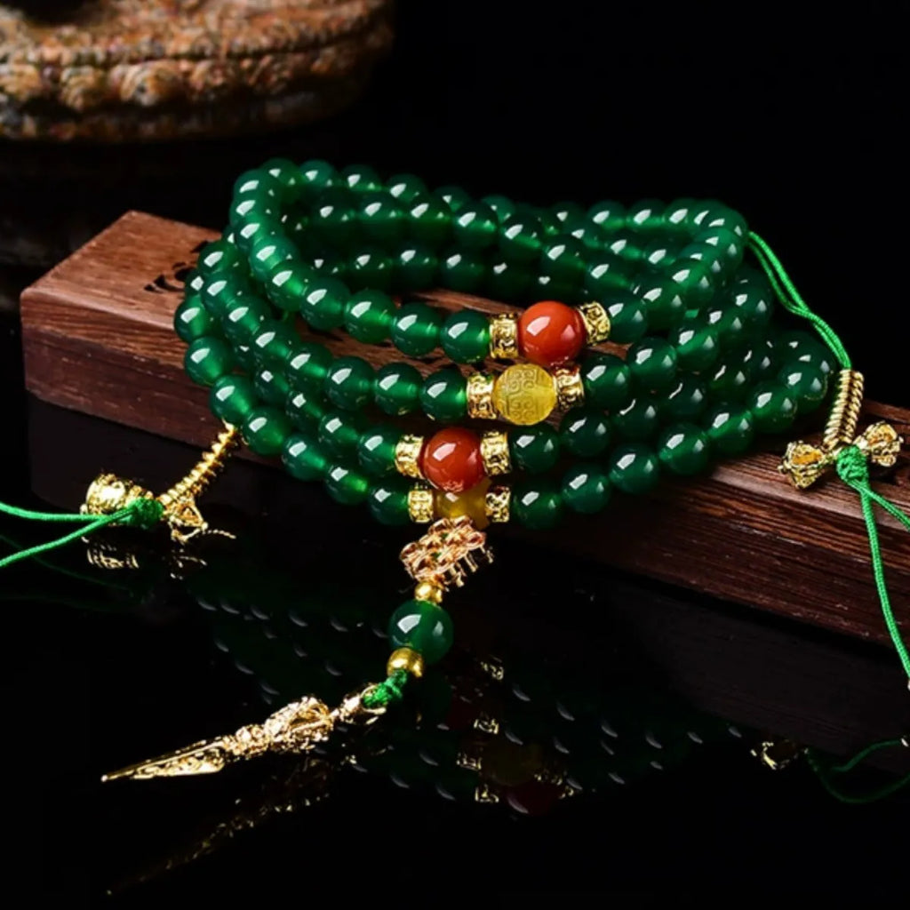 Handcrafted multi-strand bracelet with green agate beads from Brazil, showing size options.