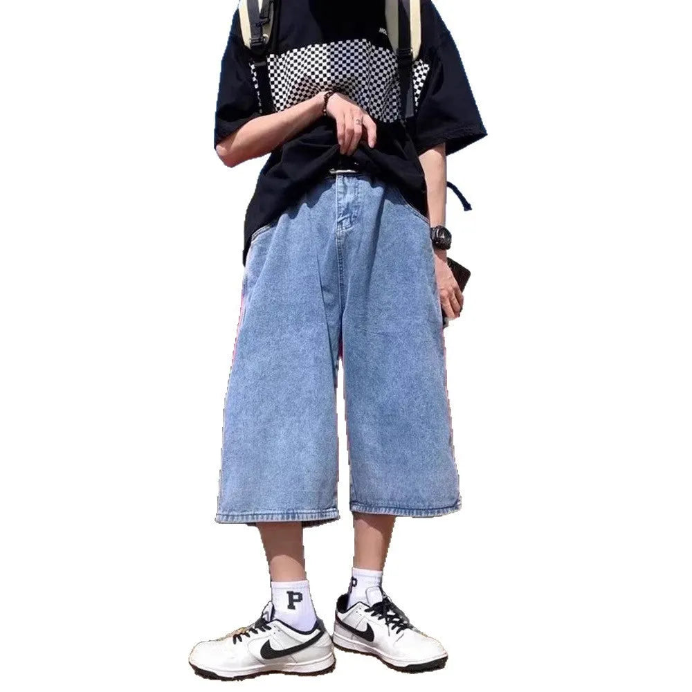 Blue men's washed denim pirate shorts with a high waist and cropped length on a neutral background.