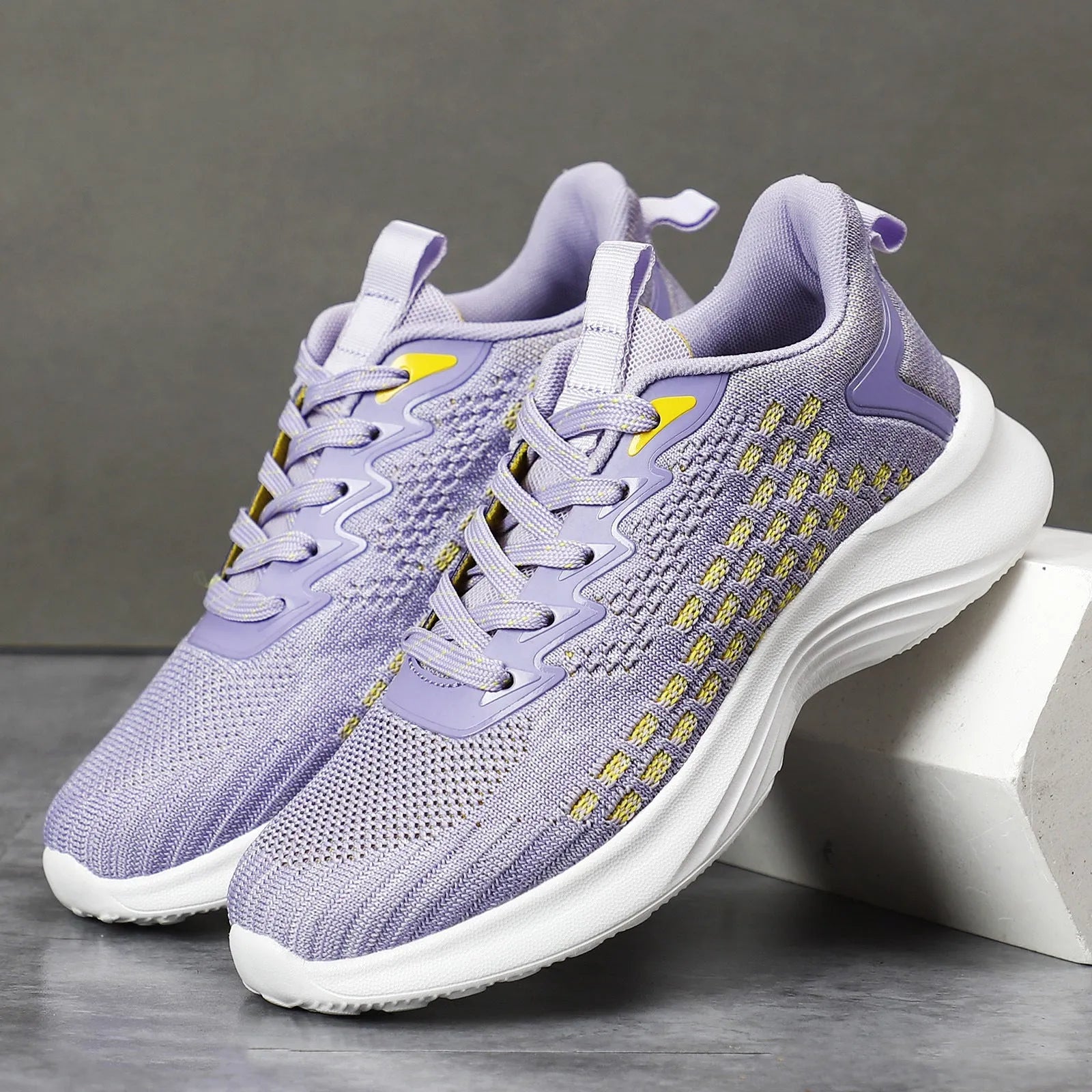 Women's lavender purple Flyknit running shoes with mesh lining and EVA sole