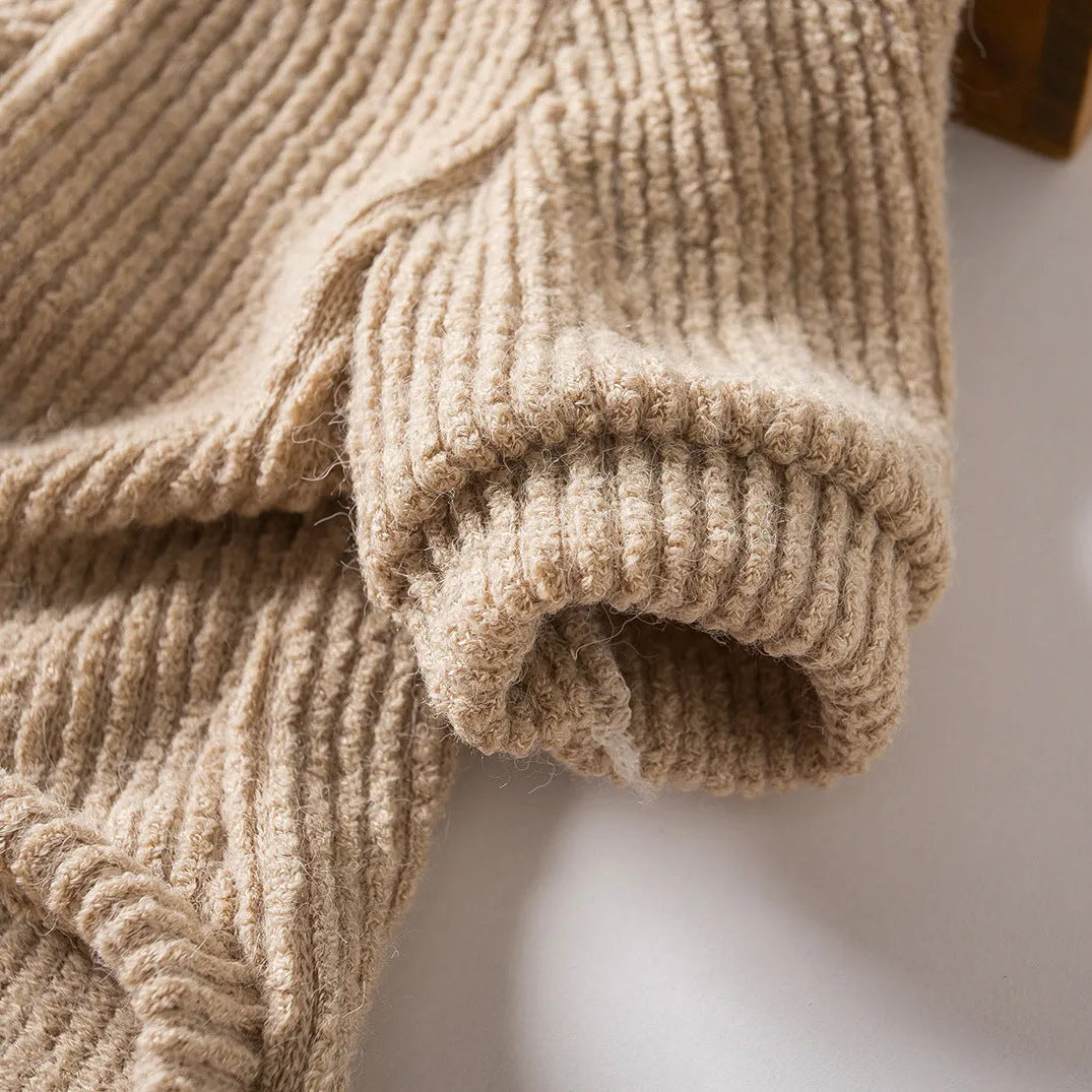 Brown cloth dog sweater pullover for small breeds on size chart showing XS to XL