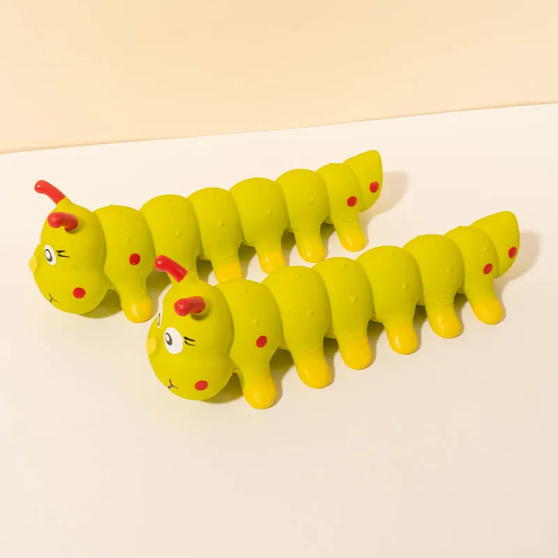 Yellow rubber caterpillar-shaped dog toy with squeaker for small medium breeds