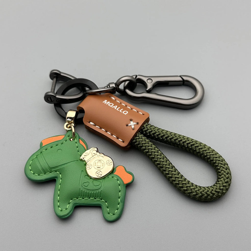 Handmade zinc alloy cowhide car key pendant on a flannel rope strap in various colour options.