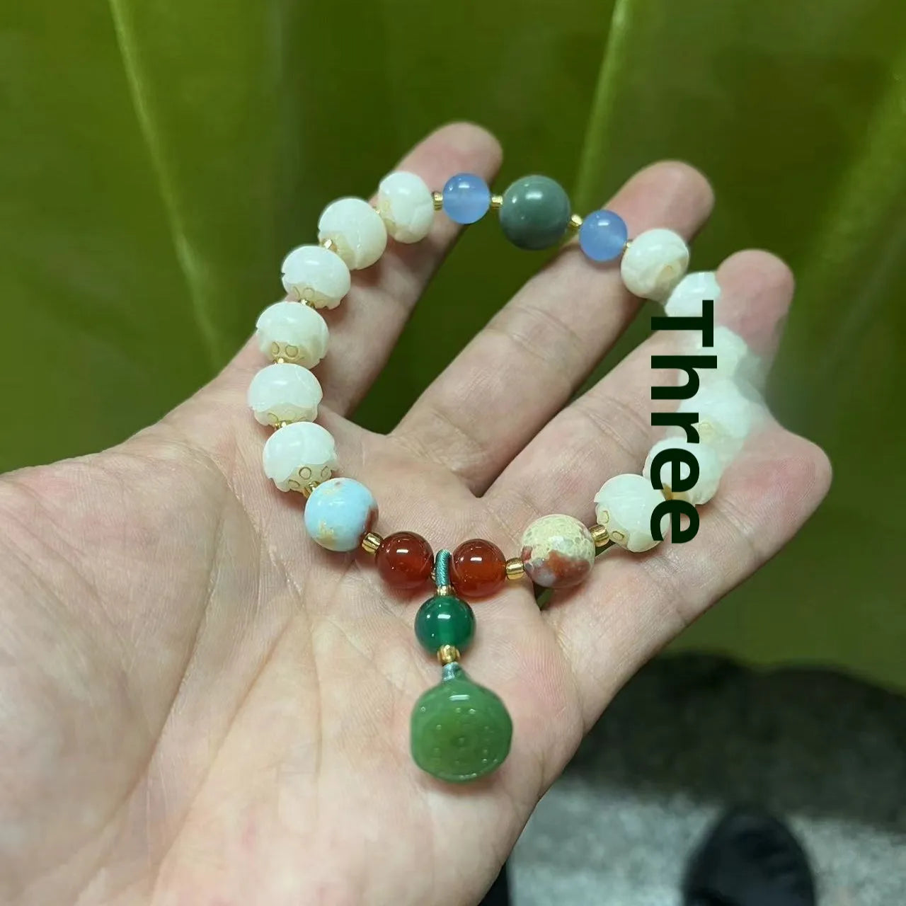 Carved pumpkin lotus Bodhi root bracelet with white jade beads and multiple dimensions