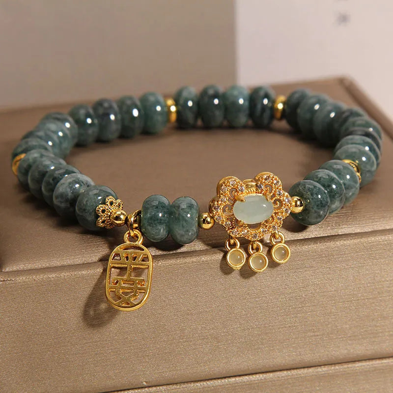Women's natural emerald jade bracelet with abacus bead design and alloy safety lock closure