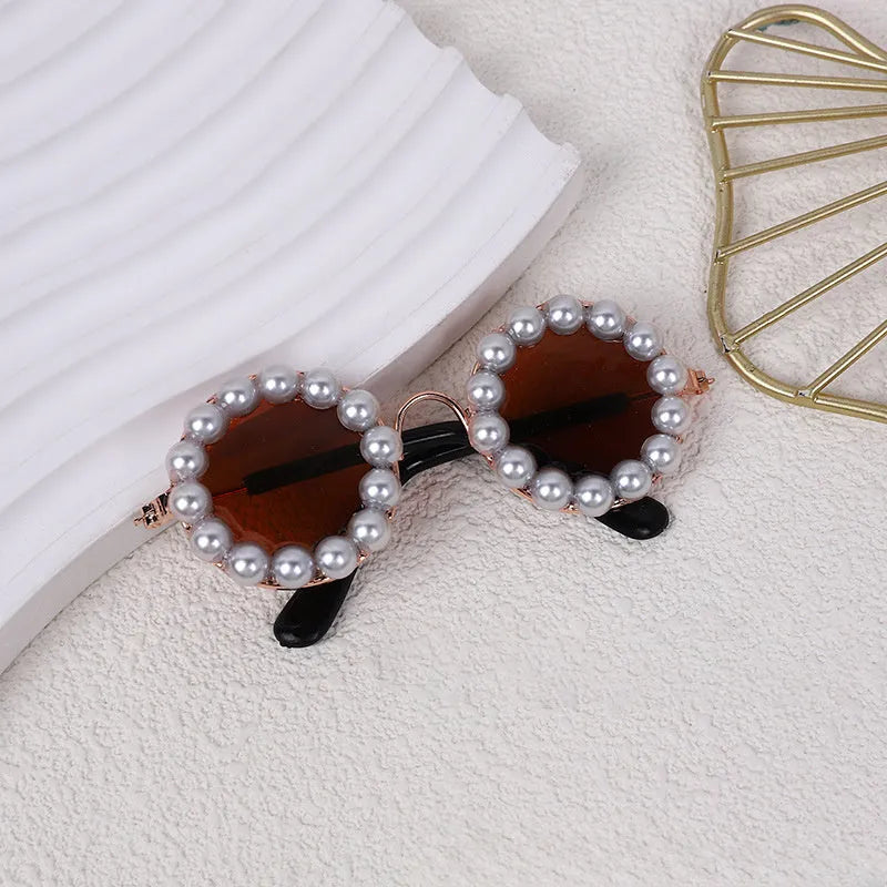 Pearl-rimmed round sunglasses for cats and dogs in five colour options with two size choices