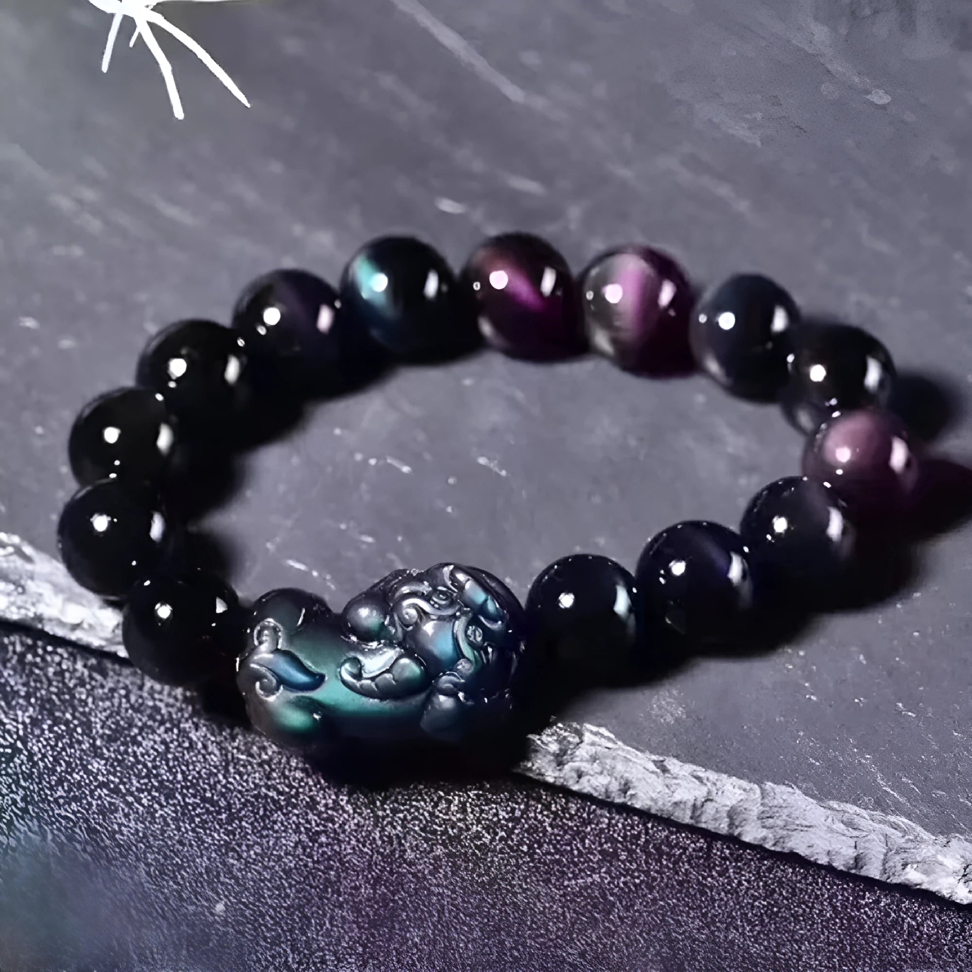 Natural ice colour eye obsidian crystal bracelet showing marbled patterning on beads