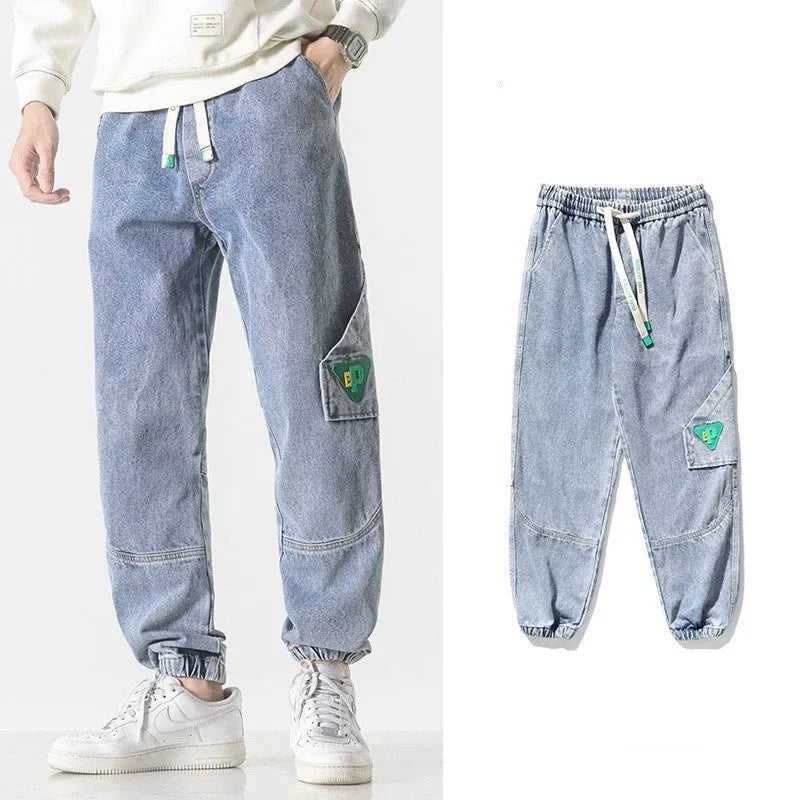 Men's loose-fit tapered cotton trousers in black, blue, or grey with mid waist design
