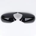 Pair of BMW 3 Series E90 ABS plastic rearview mirror housings in black and carbon pattern finishes