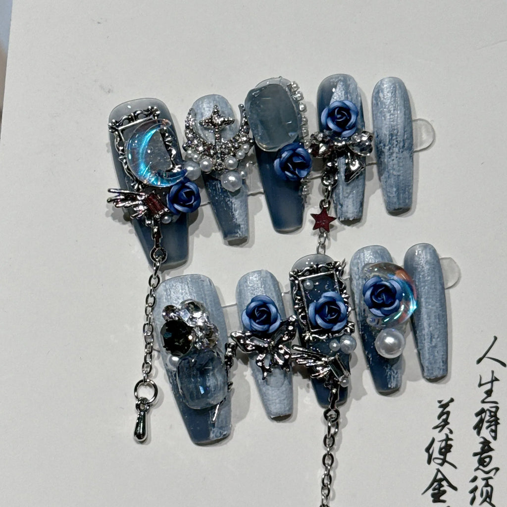 Heavy industry night blue nail stickers with ornate rose and tulip flower pattern for evening manicures.