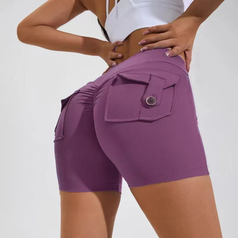 Women's high-waist fitness shorts with side pockets in quick-dry nylon fabric