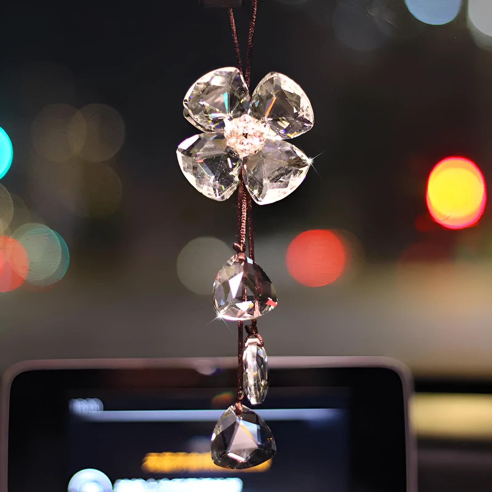 Crystal four leaf grass car pendant in four colour options hanging from rearview mirror