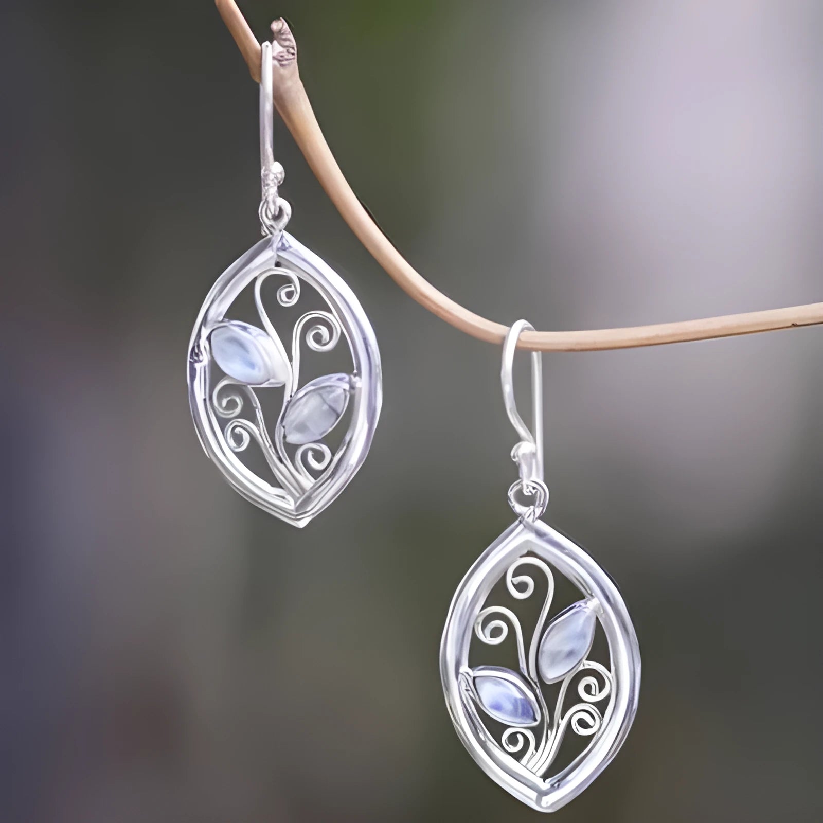 Women's creative leaf design earrings with embedded colourful moonstones in silver alloy setting