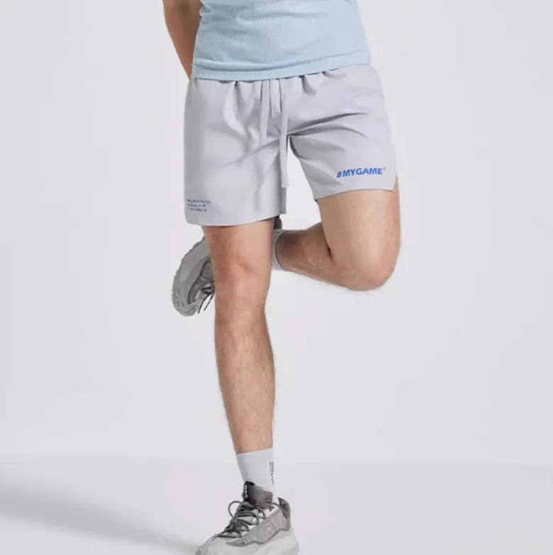 Men's training shorts in four colours with moisture-wicking polyester and spandex fabric