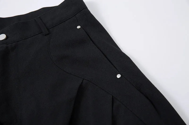 Black men's wide-leg casual trousers with front pleated machete detailing on a mid waist.