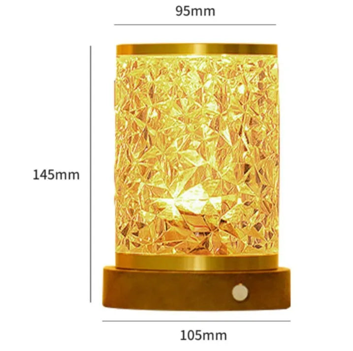 Compact acrylic rotating water ripple night light on a solid wood base with USB cable.