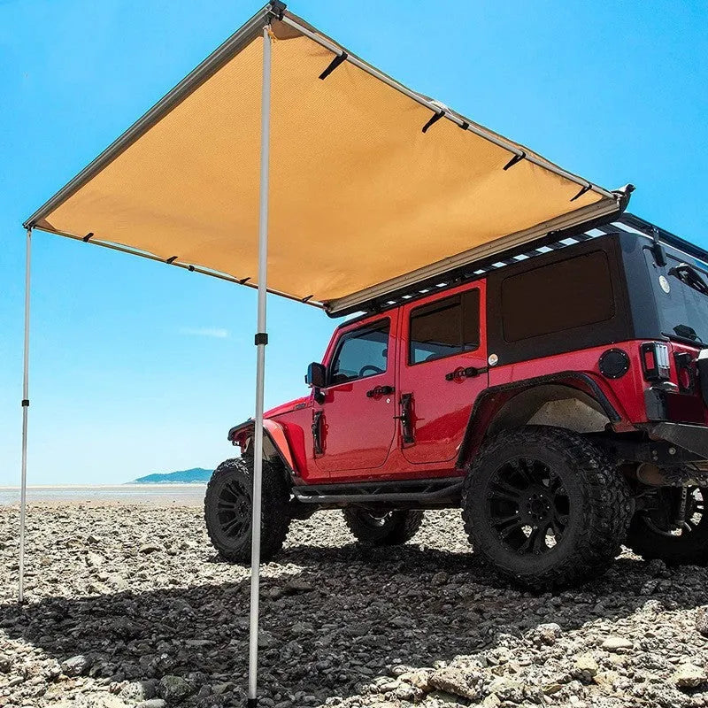 Green two-room camping tent with aluminium poles pitched in an outdoor setting