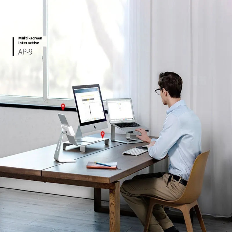 Aluminium alloy laptop stand riser in black or silver with 18.5cm height and non-slip silicone pads