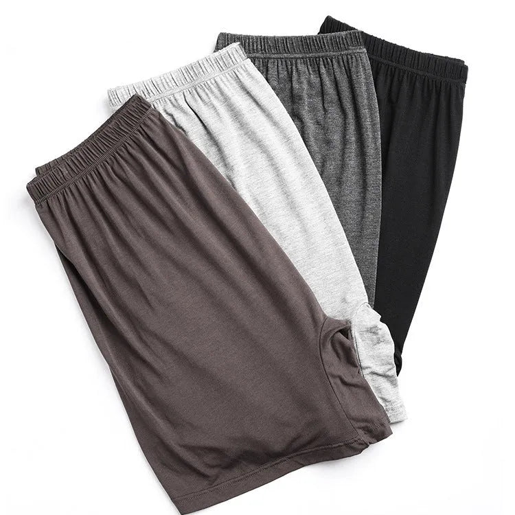 Solid colour modal high-waist men's boxer shorts in black, blue, grey, and brown.